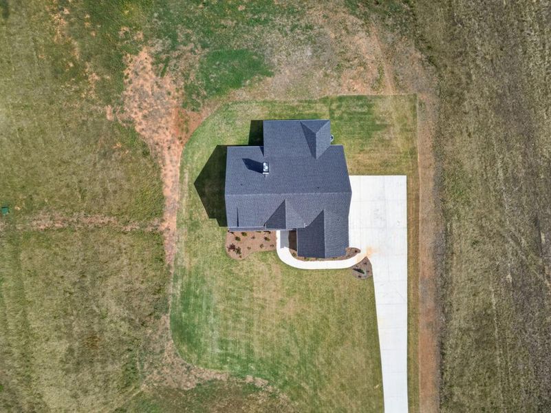 Front exterior of a new home in Blackwelder Bluff, Bowdon, GA, highlighting curb appeal (Image 32).