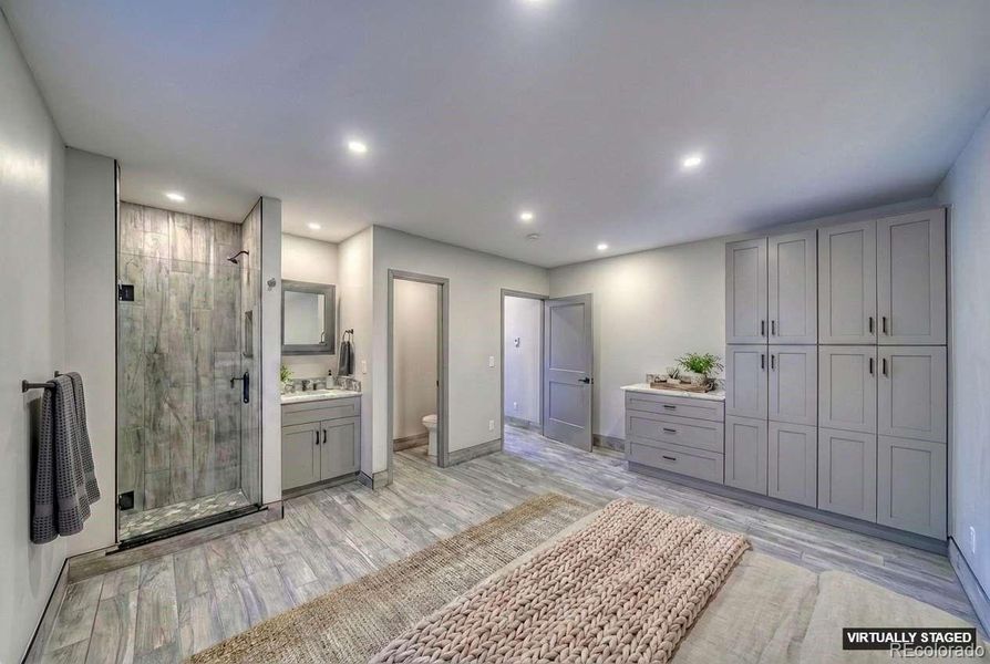 Main-level ensuite Guest Bathroom 2 Virtually staged