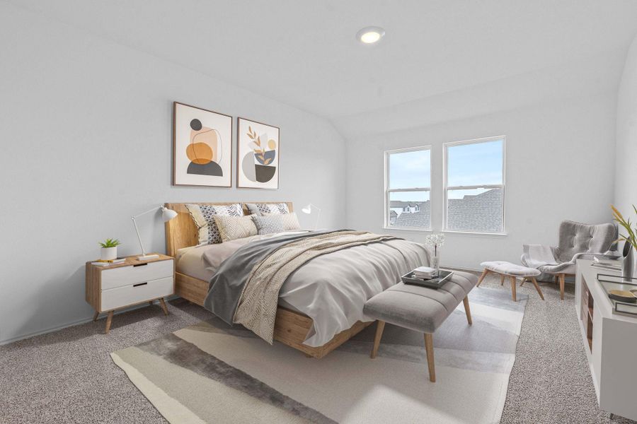 Bedroom with carpet floors and lofted ceiling Bedroom with carpet floors and lofted ceiling