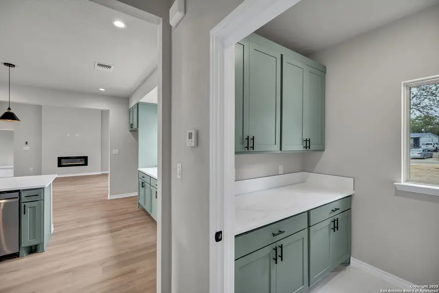 Furnished interior view inside a new home in , Elmendorf (Image 7).