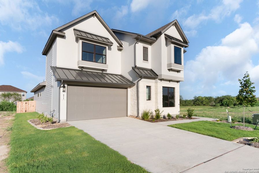 Front exterior of a new home in Nolte Farms, Seguin, TX, highlighting curb appeal (Image 31).