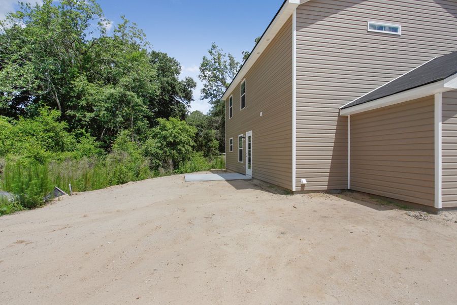 Representative exterior photo of a completed home built from the The Pamona by RTS Homes in Grand Reserve, Hinesville, GA (Image 20).