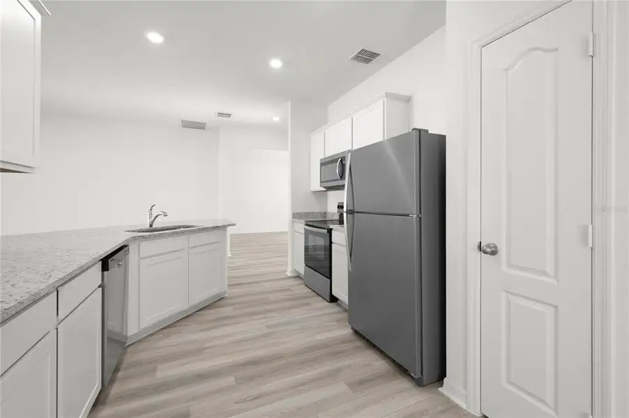 Furnished interior view inside a new home in Tula Parc, Astatula (Image 6). Furnished interior view inside a new home in Tula Parc, Astatula (Image 6).