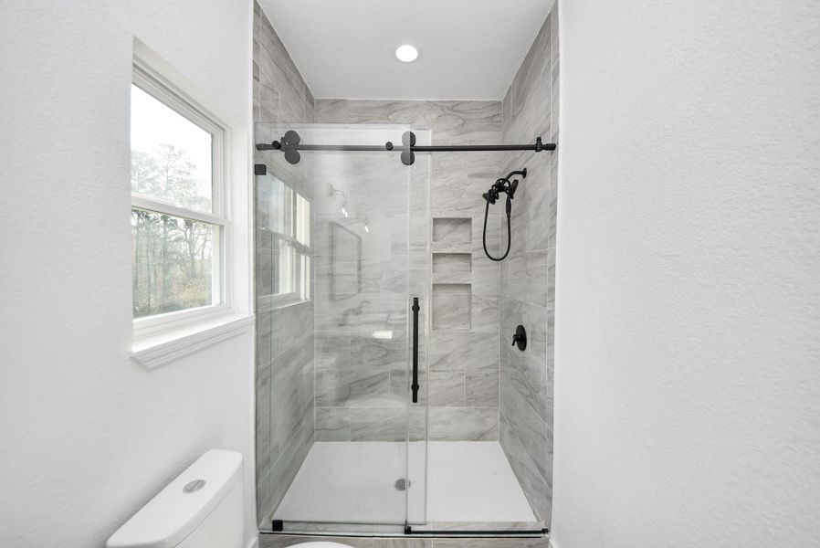 Furnished interior view inside a new home in , Conroe (Image 5).