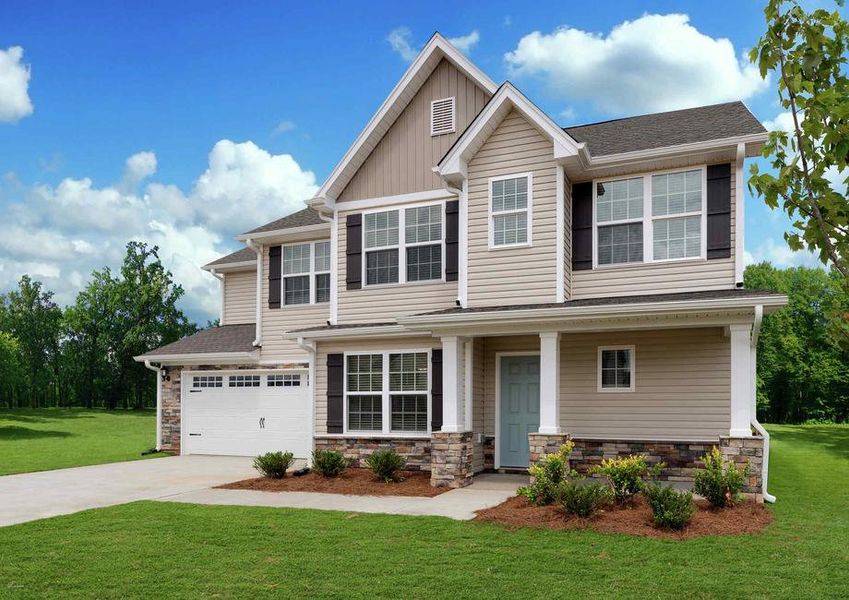 Lee house plan front yard with green grass, plants, and tan color siding