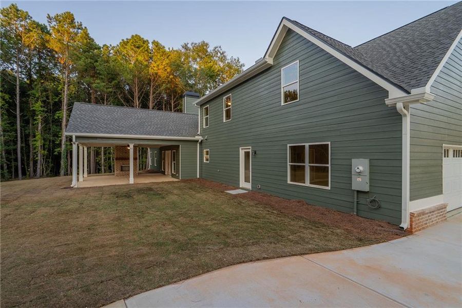 Front exterior of a new home in , Social Circle, GA, highlighting curb appeal (Image 2).