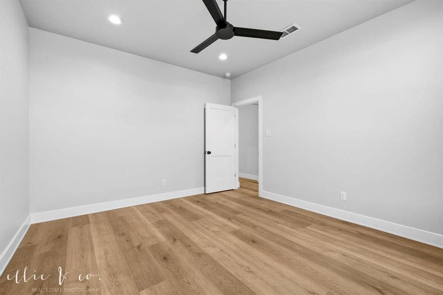 Unfurnished room with light wood-type flooring, recessed lighting, and ceiling fan