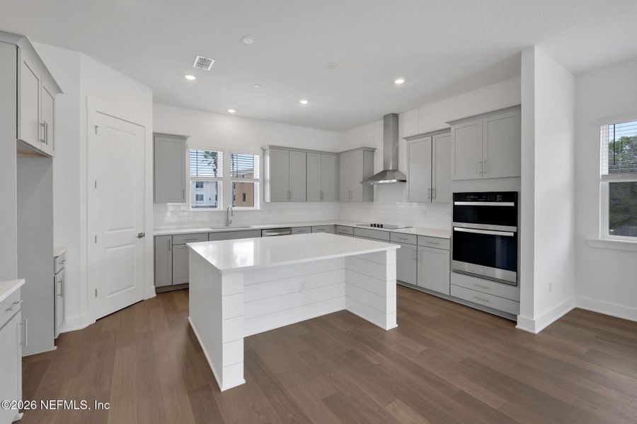 Furnished interior view inside a new home in North Beach Townhomes, Jacksonville Beach (Image 16).