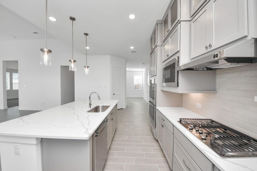 Furnished interior view inside a new home in Meridiana, Manvel (Image 9).