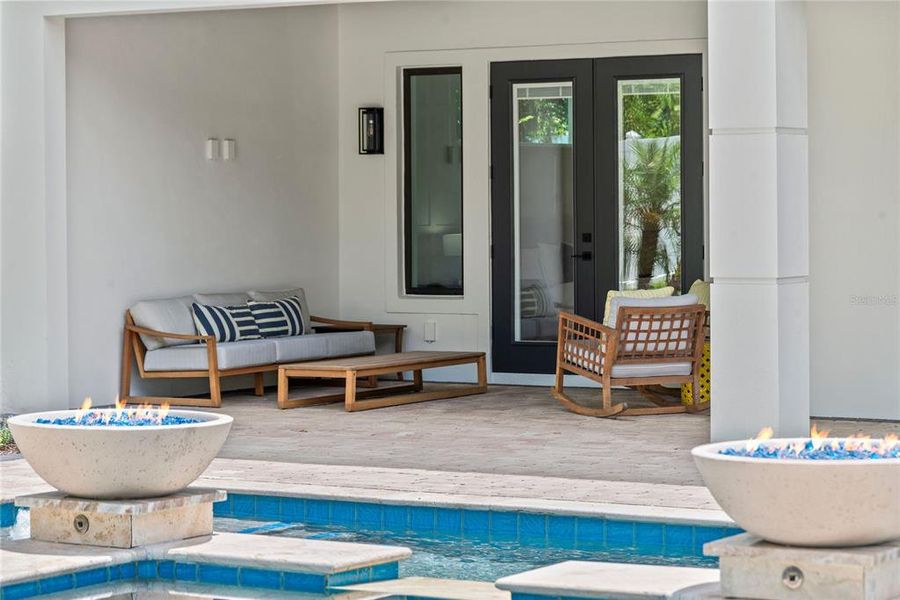 Heated pebbletec saltwater pool with spa, sunshelf with water feature, variable speed high efficiency pump, and 2 gas fireballs? Heated pebbletec saltwater pool with spa, sunshelf with water feature, variable speed high efficiency pump, and 2 gas fireballs?