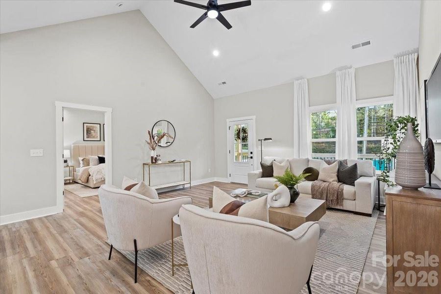 Photo of nearly identical home so you can see the space with furniture.