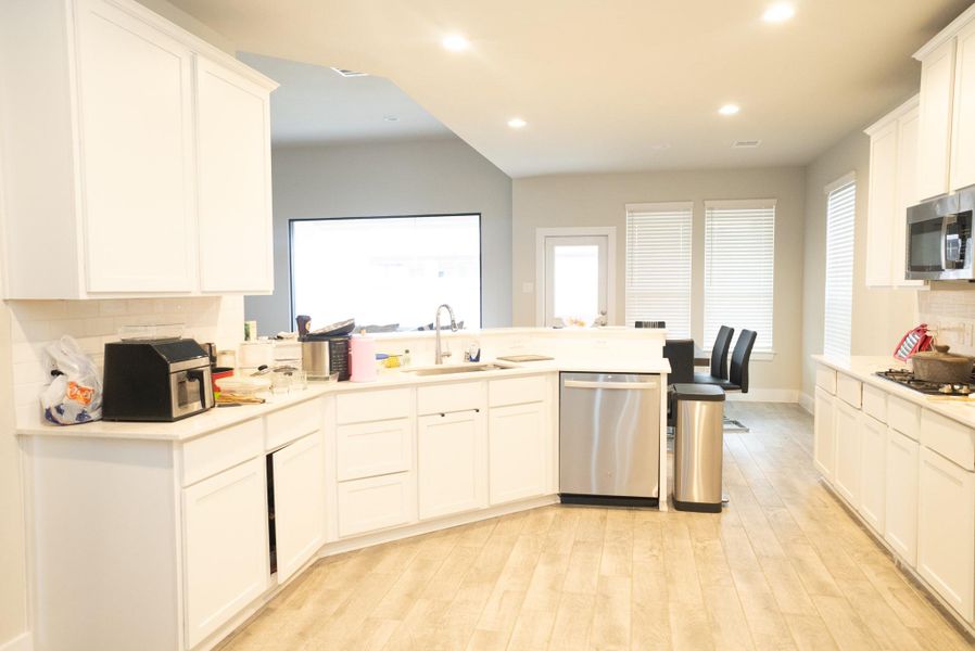 Furnished interior view inside a new home in Sunterra, Katy (Image 9).