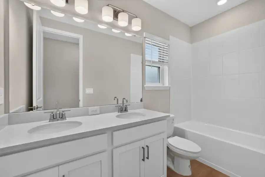 Furnished interior view inside a new home in Westview Community Group Page, Kissimmee (Image 15).