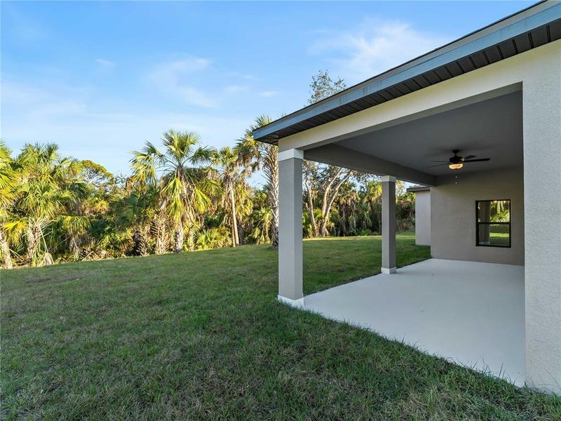 Exterior details and patio area of a home in , North Port (Image 35).