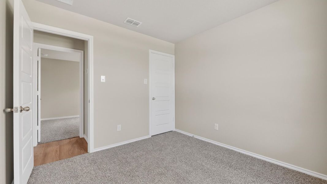Spacious, unfurnished interior of a new home in Monarch at the Meadows, Ponder (Image 23).