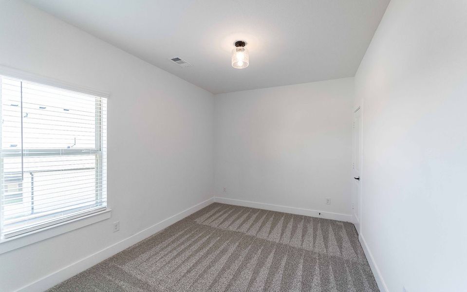 Spacious, unfurnished interior of a new home in Solterra, Mesquite (Image 25).