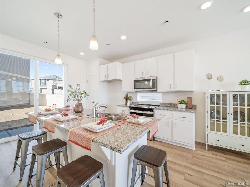 Furnished interior view inside a new home in Thompson River Ranch, Johnstown (Image 9).