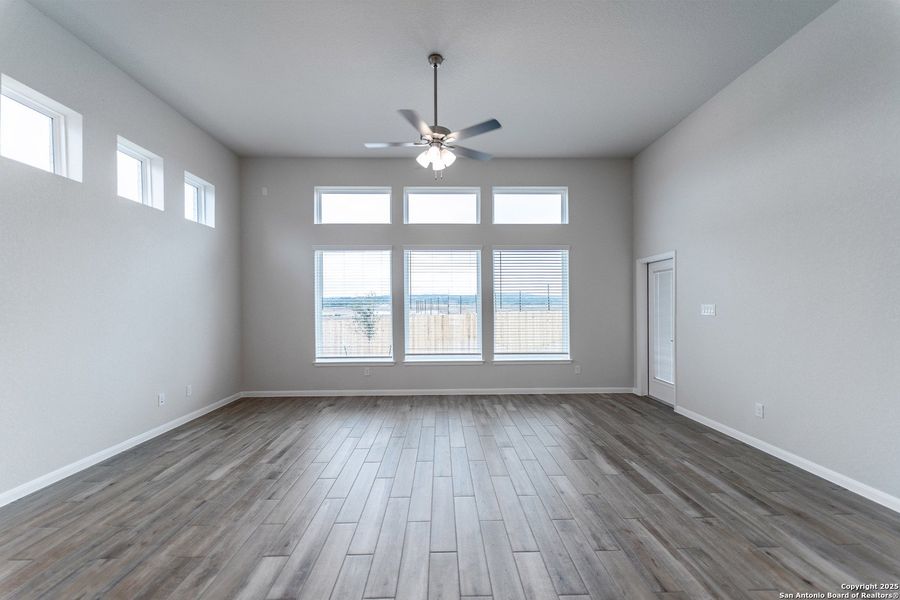 Spacious, unfurnished interior of a new home in The Woodlands at Medina Hills, Mico (Image 16).