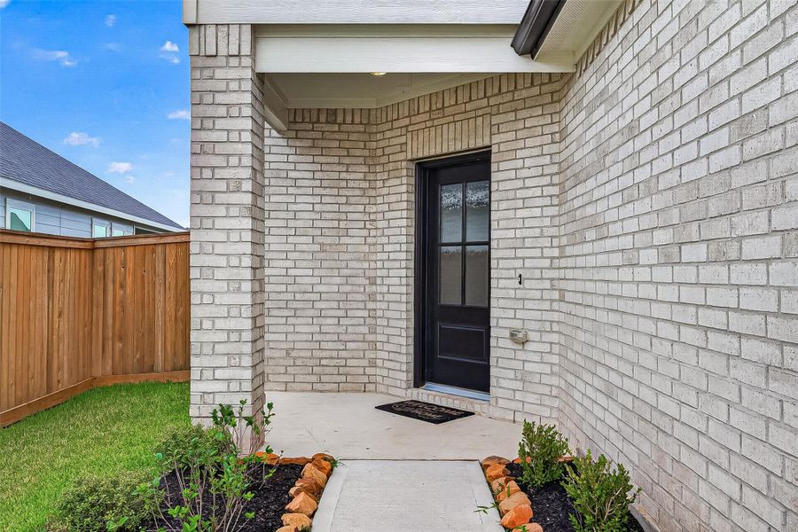 Exterior details and patio area of a home in La Segarra, Brookshire (Image 4). Exterior details and patio area of a home in La Segarra, Brookshire (Image 4).