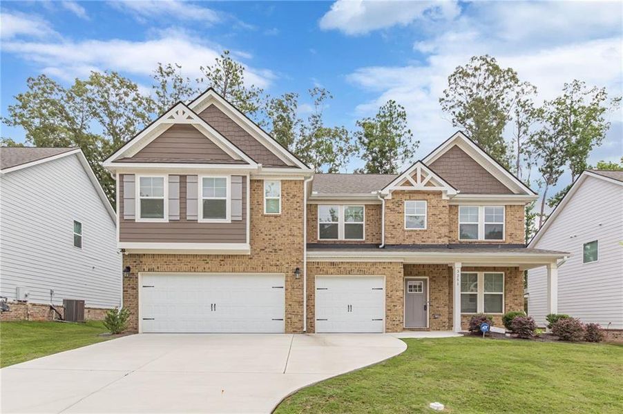 Front exterior of a new home in Twin Shoals, Atlanta, GA, highlighting curb appeal (Image 23). Front exterior of a new home in Twin Shoals, Atlanta, GA, highlighting curb appeal (Image 23).
