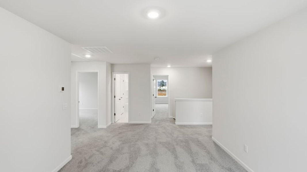 Spacious, unfurnished interior of a new home in Waverly Station, Greenwood (Image 25).