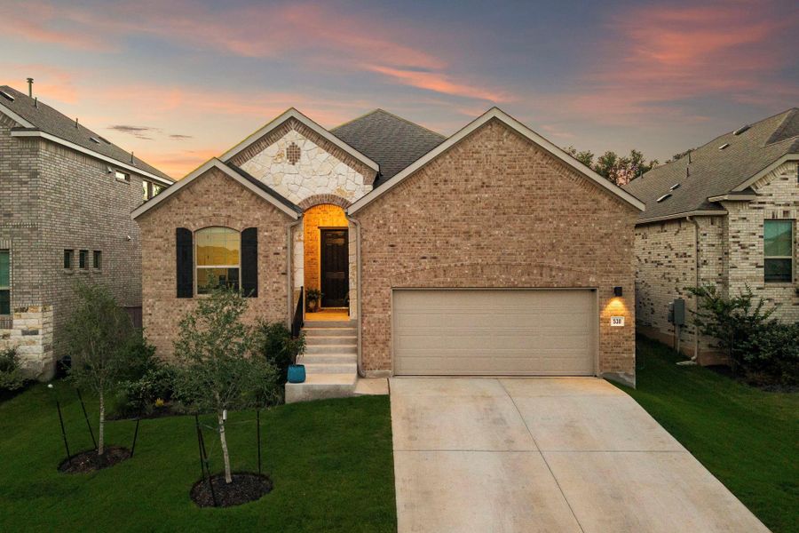 Front exterior of a new home in Anthem, Kyle, TX, highlighting curb appeal (Image 1). Front exterior of a new home in Anthem, Kyle, TX, highlighting curb appeal (Image 1).