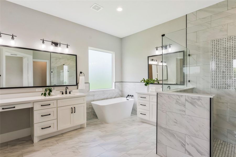 Spacious elegance with dual vanities.