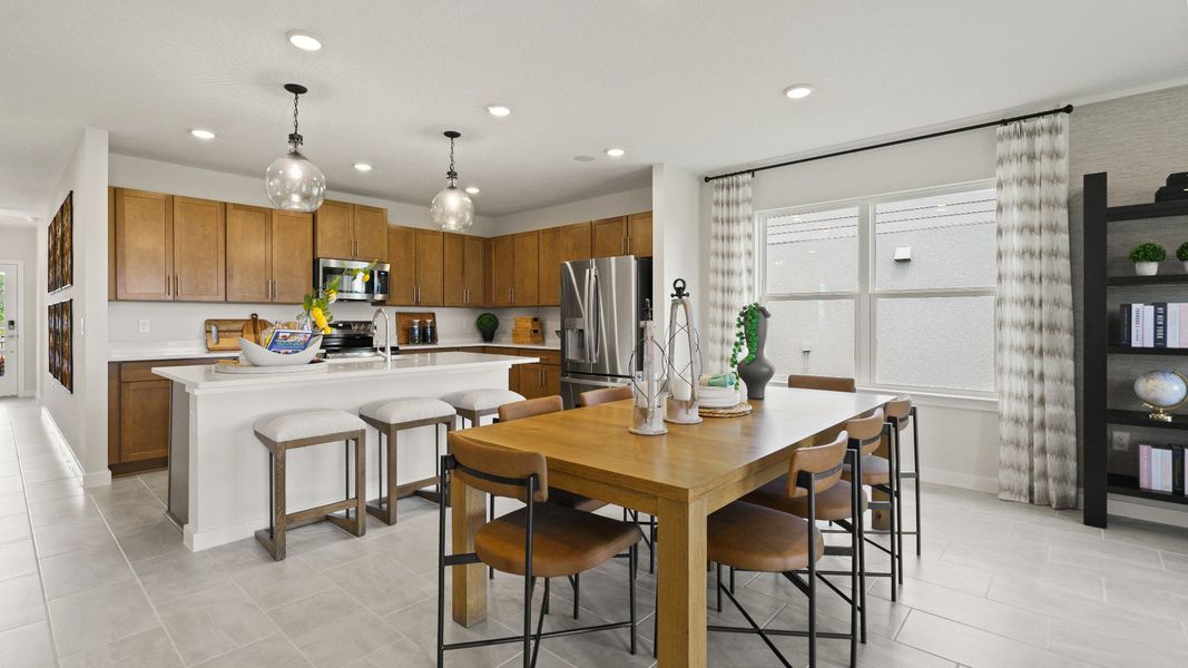 Castaway Kitchen and Dining Area, new home plan available at Liberty Trace in Haines City, fl