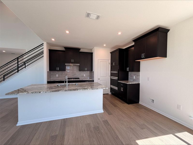 Furnished interior view inside a new home in Crosswinds, Kyle (Image 3).