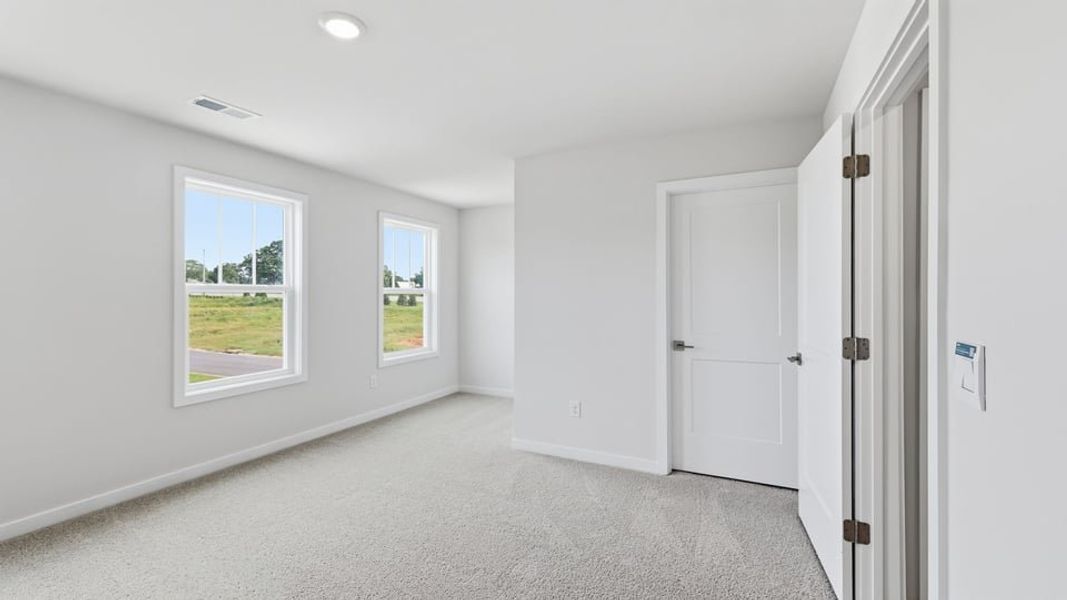 Spacious, unfurnished interior of a new home in Adams Glen, Greenville (Image 32). Spacious, unfurnished interior of a new home in Adams Glen, Greenville (Image 32).