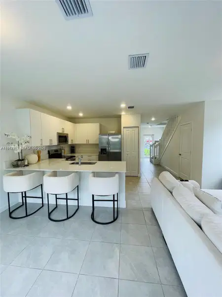 Furnished interior view inside a new home in , Pembroke Park (Image 5).