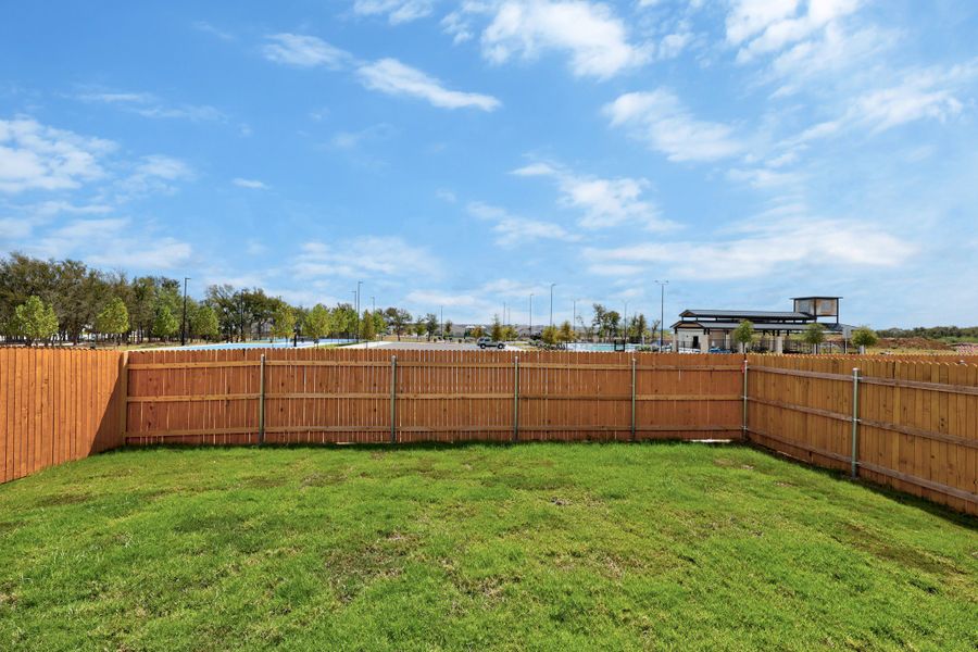 Exterior details and patio area of a home in Trinity Ranch, Elgin (Image 23).