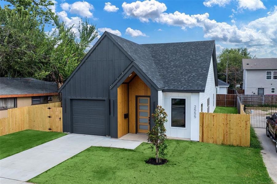 Front exterior of a new home in , Dallas, TX, highlighting curb appeal (Image 17).
