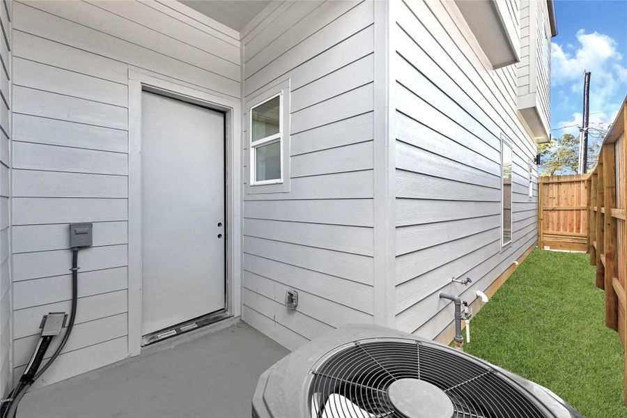 Exterior details and patio area of a home in , Houston (Image 4). Exterior details and patio area of a home in , Houston (Image 4).