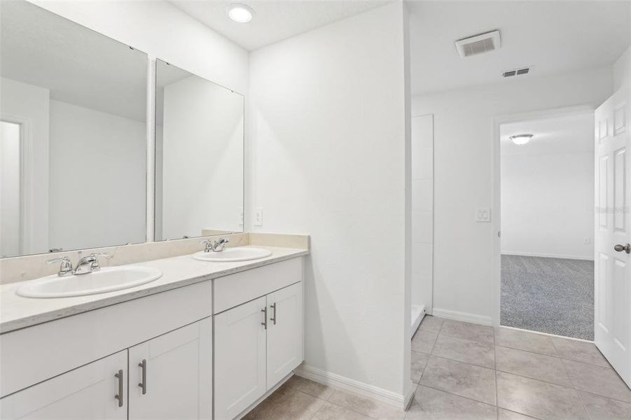 Furnished interior view inside a new home in Lake Deer Estates - Signature Series, Poinciana (Image 8). Furnished interior view inside a new home in Lake Deer Estates - Signature Series, Poinciana (Image 8).