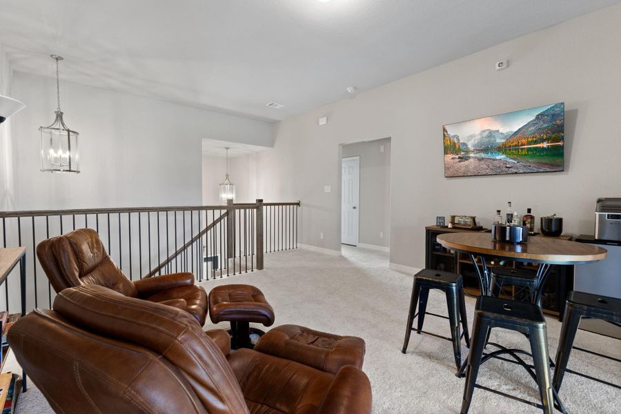 Upstairs enjoy a game room surrounded by 3 additional bedrooms.