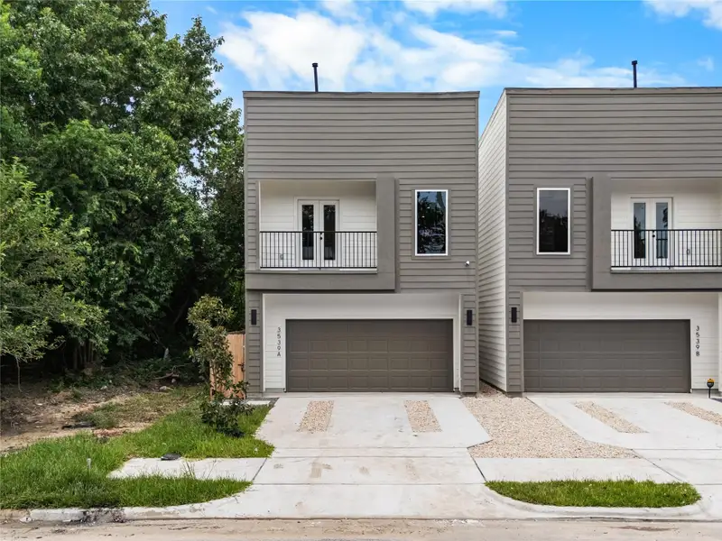 Exterior elevation showcasing a second floor balcony - perfect for relaxing Exterior elevation showcasing a second floor balcony - perfect for relaxing