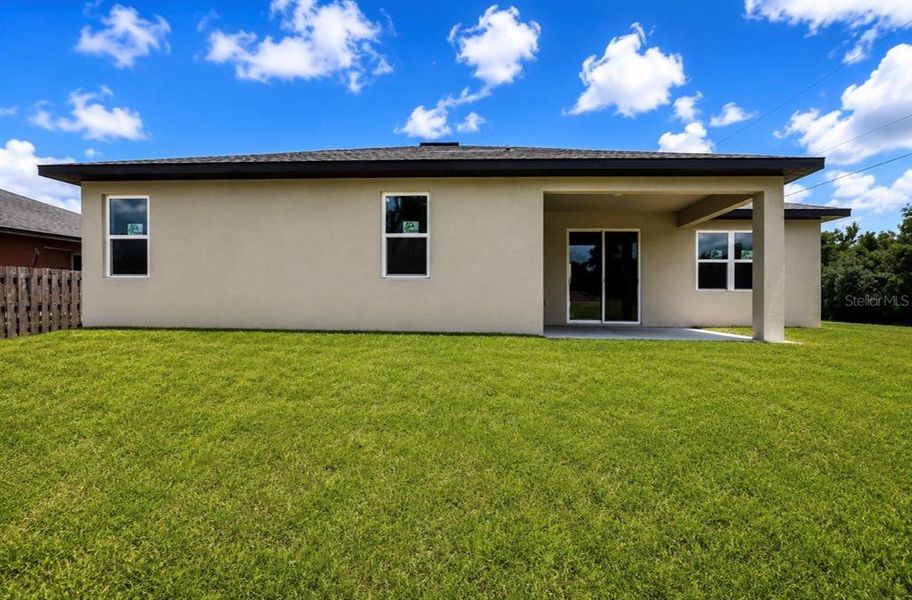 Exterior details and patio area of a home in , Poinciana (Image 3). Exterior details and patio area of a home in , Poinciana (Image 3).