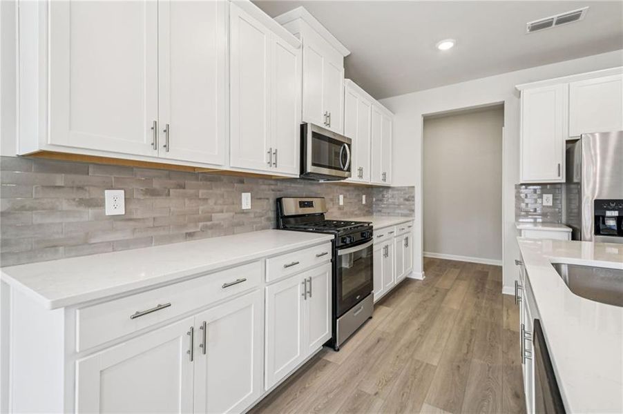 Furnished interior view inside a new home in Creekside at Oxford Park, Fairburn (Image 17).