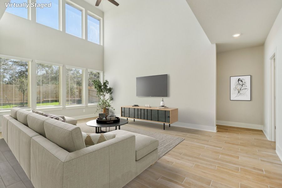 Living room in the Cedar floorplan at a Meritage Homes community.