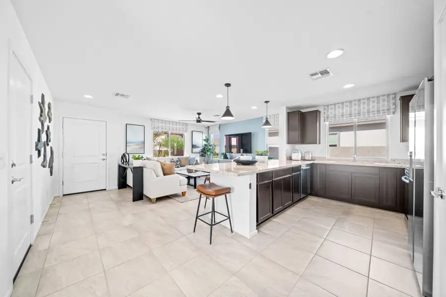 Great Room & Kitchen | Pinnacle | Wildera – Crest Series | New Homes in San Tan Valley, AZ by Landsea Homes Great Room & Kitchen | Pinnacle | Wildera – Crest Series | New Homes in San Tan Valley, AZ by Landsea Homes