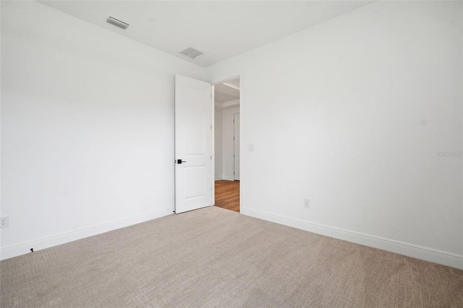 Spacious, unfurnished interior of a new home in North River Ranch, Parrish (Image 34).