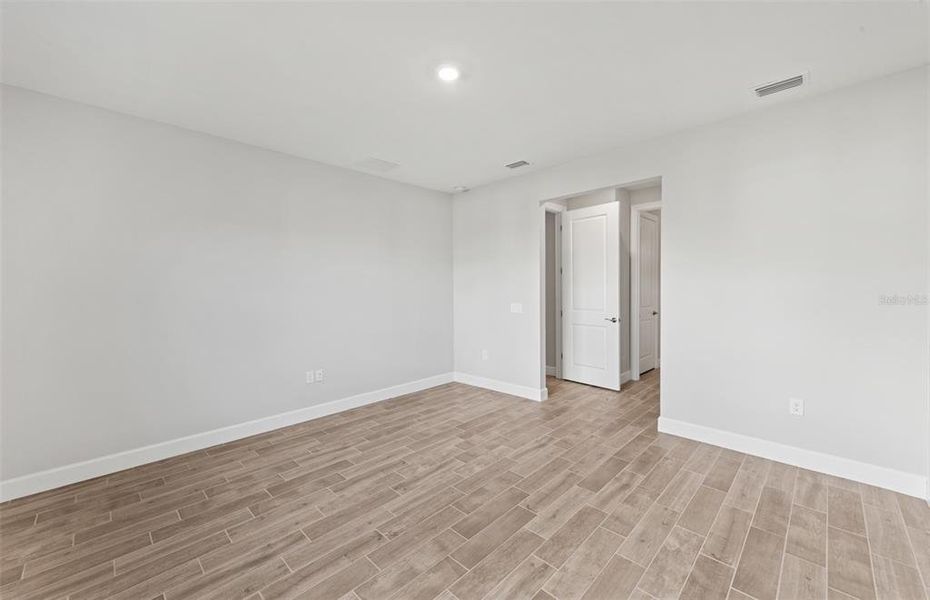 Spacious, unfurnished interior of a new home in Arbor Oaks, North Port (Image 18). Spacious, unfurnished interior of a new home in Arbor Oaks, North Port (Image 18).