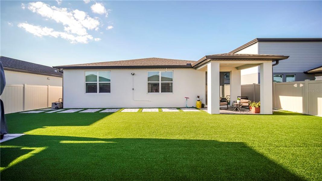 Exterior details and patio area of a home in , St. Cloud (Image 30).