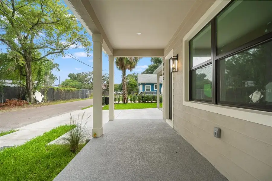 Exterior details and patio area of a home in , Tampa (Image 37).