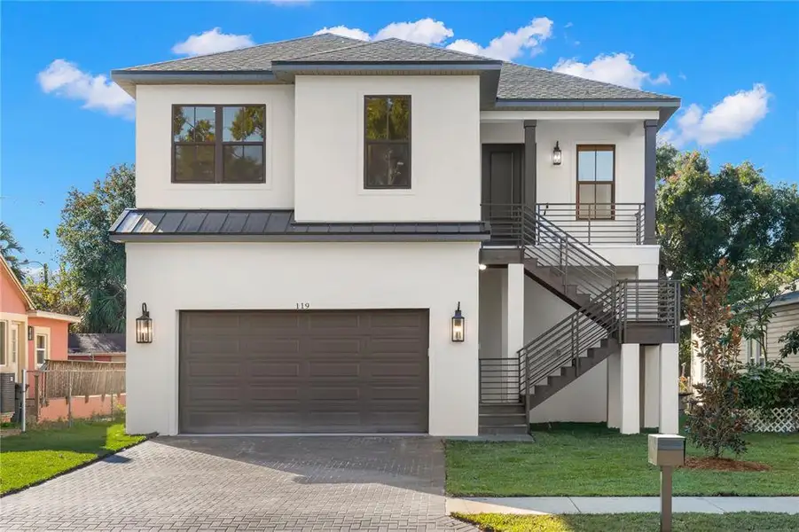 Front exterior of a new home in , Crystal Beach, FL, highlighting curb appeal (Image 1).