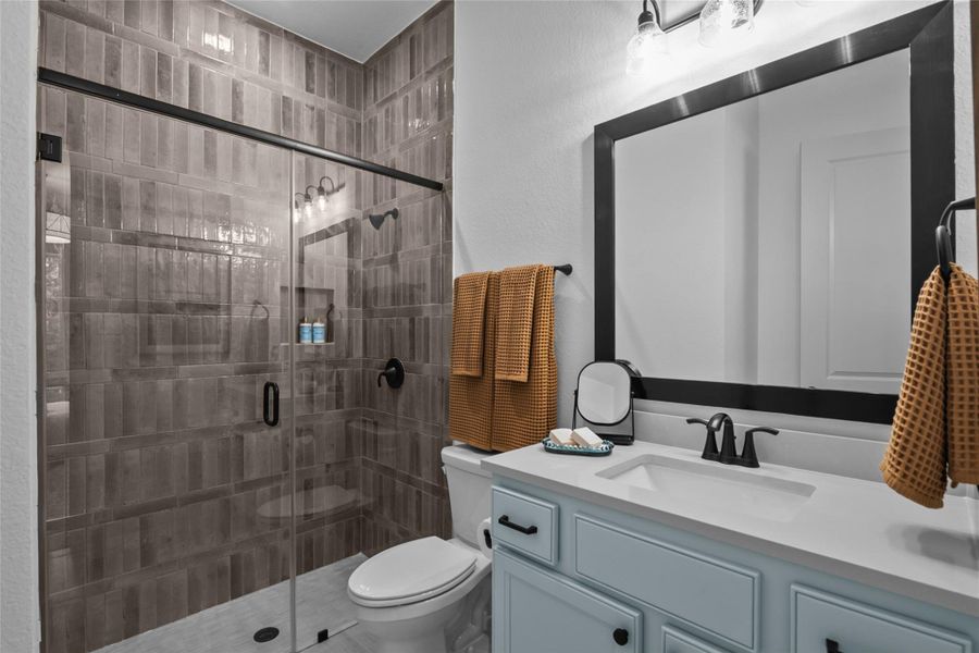 REPRESENTATIVE PHOTO:  Walk in shower at ensuite bed/bath