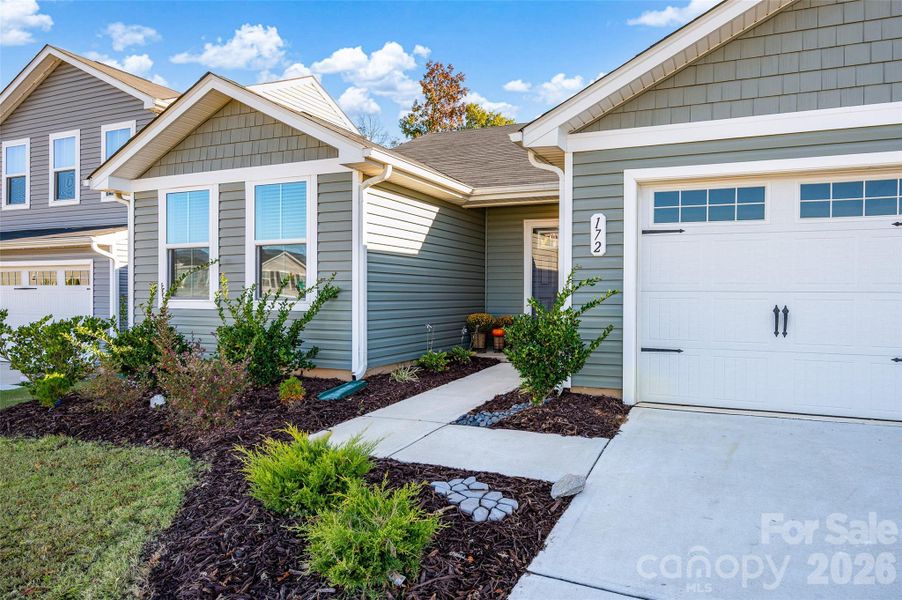 Exterior details and patio area of a home in , Troutman (Image 3).