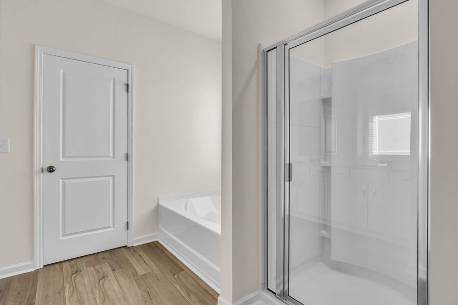 Separate garden tub and shower. Separate garden tub and shower.