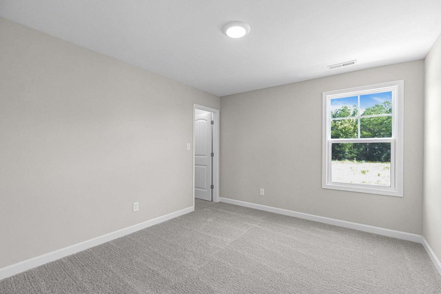 Representative unfurnished interior of a home built from the Magnolia by Caviness & Cates Communities in Bartlett Manor, Youngsville (Image 208).